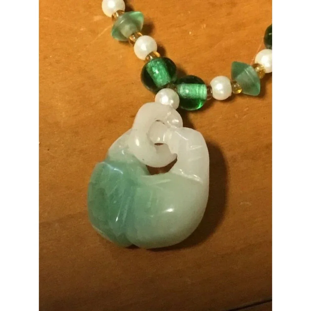 Jade and beads necklace, amazing artistry into that pendant, Look Closer.
